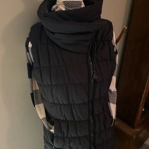 Perfect black puffer vest. Side zipper and stand up collar. Stylish and so warm!